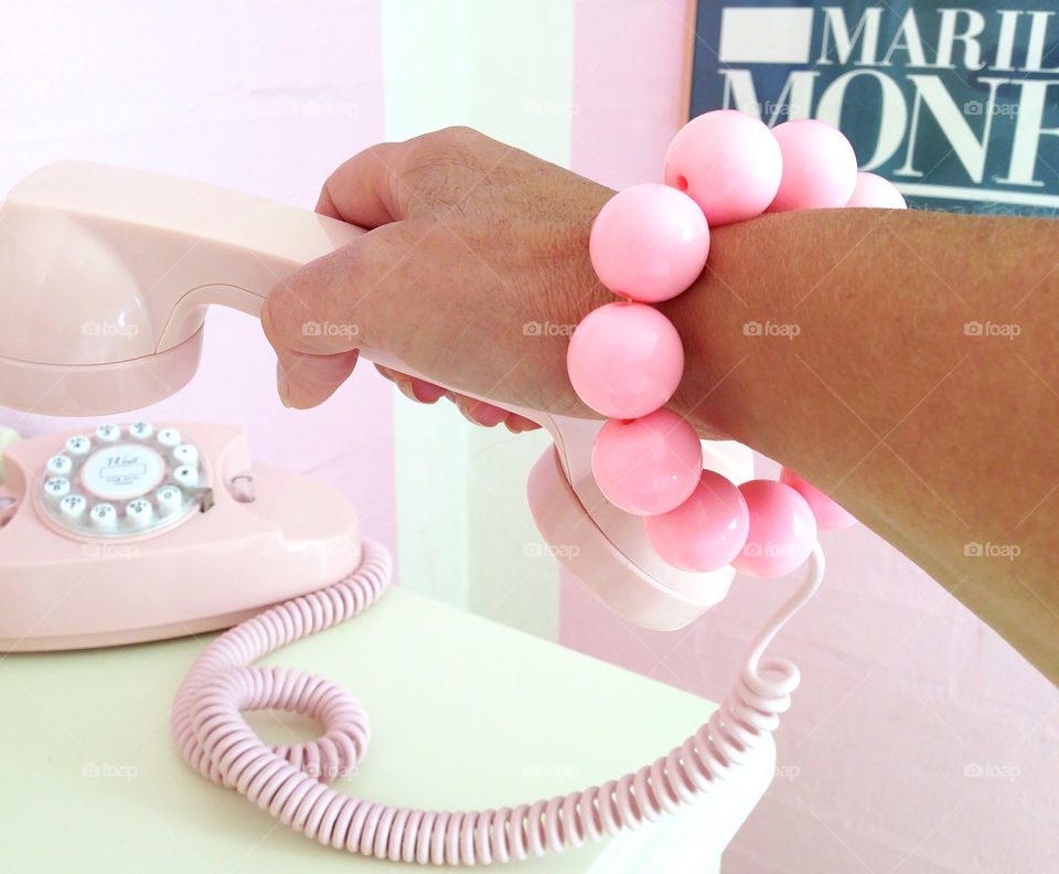 Girl hang up Pink telephone