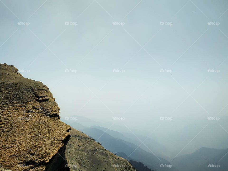 Amazing view of the mountains from the top of the rock in the morning