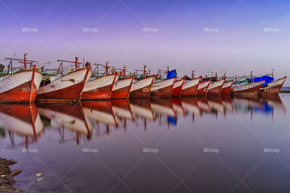Phinisi sail boat in line