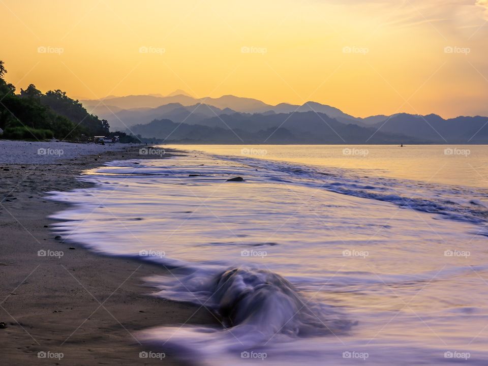 Sunrise at the Pacific Coast of Dinadiawan, Aurora Province.