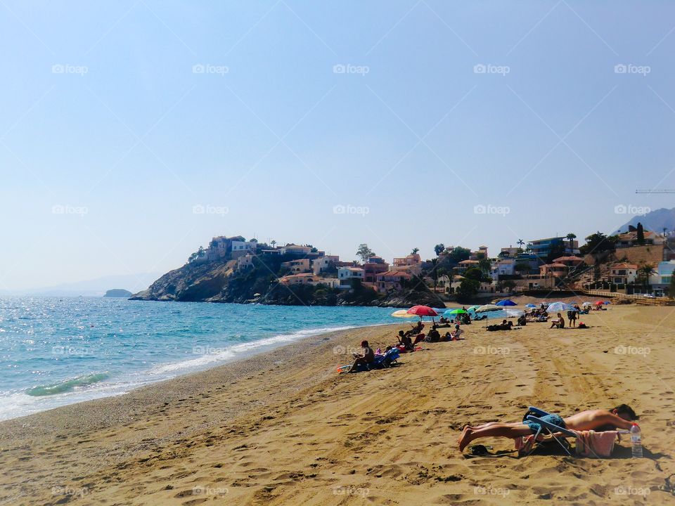 People at the beach in mazarrón 