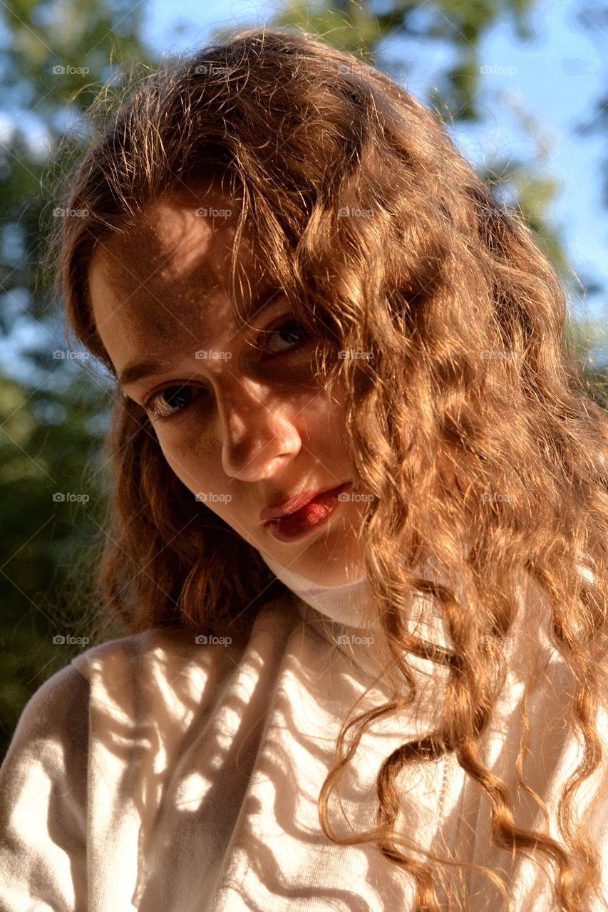 young girl beautiful portrait in sunlight