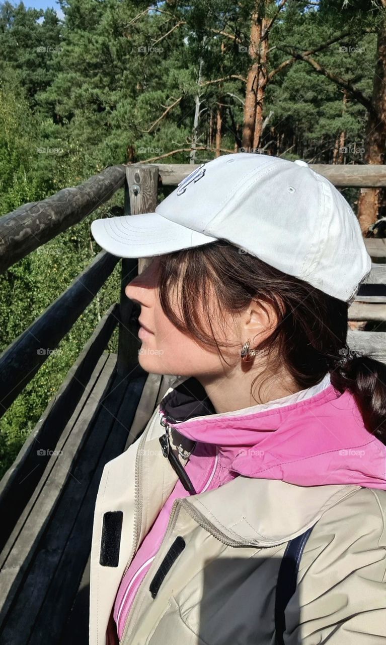 Portrait of a woman in a cap looking into the distance