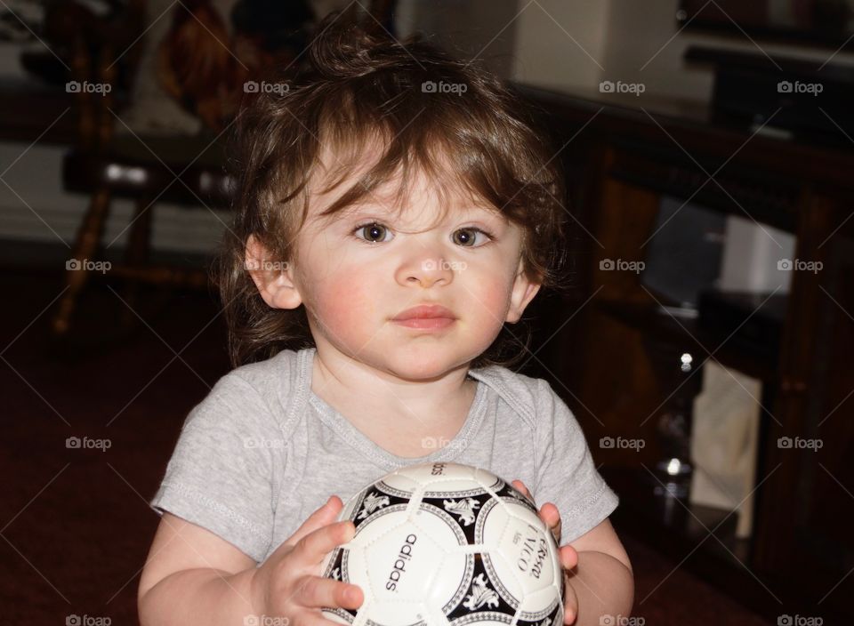 toddler with ball