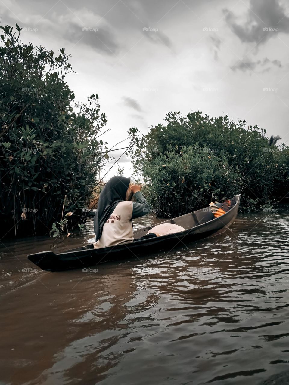 someone who paddles in the river