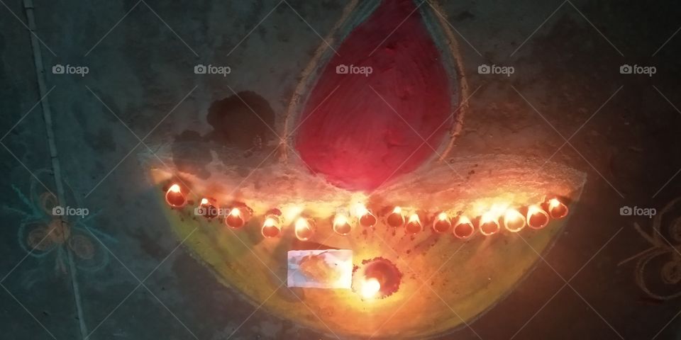 The word  'Deepawali' means rows of lighted lamps. It is a festival of lights and Hindus celebrate it with joy.Diwali or Deepawali is one of India's biggest festivals. people light up their houses and shops with Diyas, small cup-shaped oil lamp.