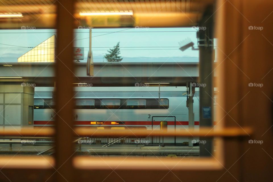 View through a train window at the station on the ICE to Vienna