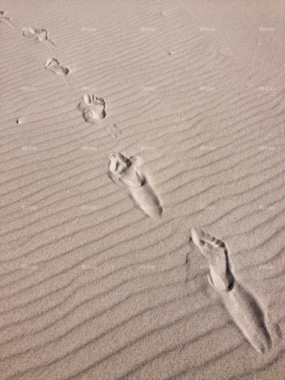 Foot prints on sand