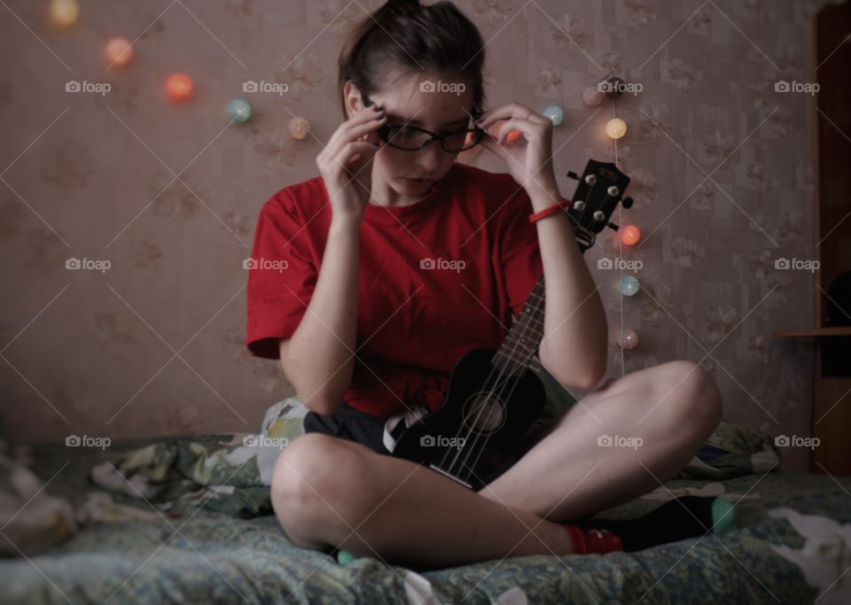 girl and ukulele