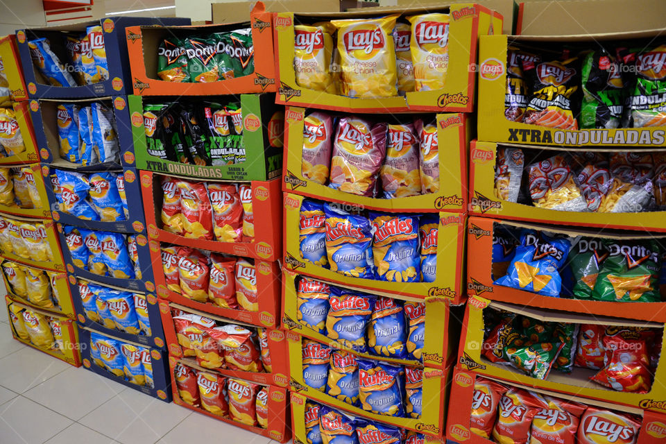 Different types of chips and snacks in a supermarket in Majorca.