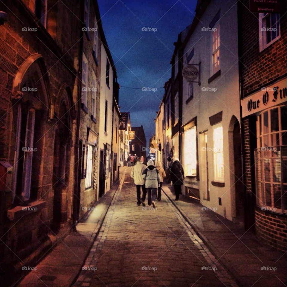whitby north yorkshire street people dark by benmellors