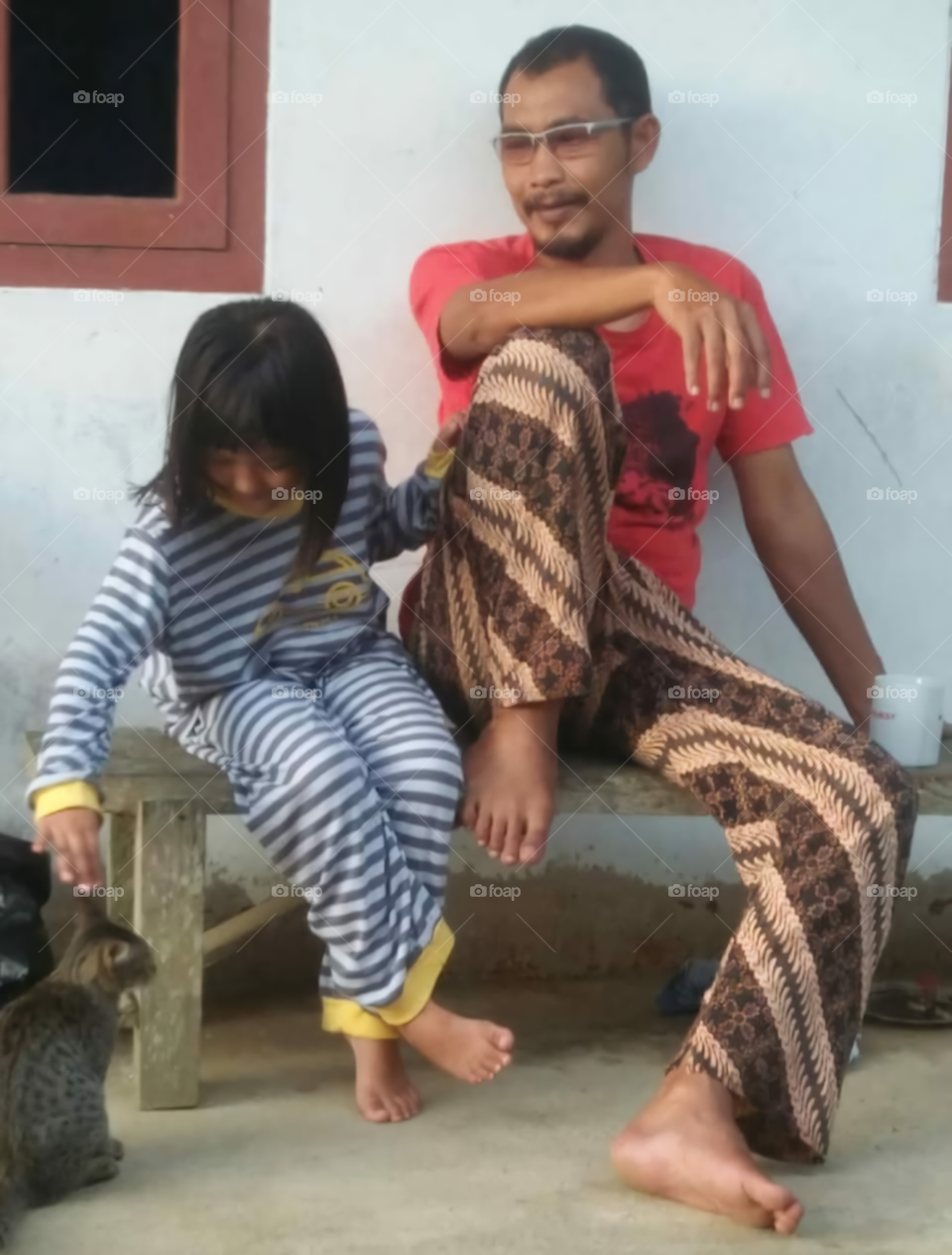 Between Father, Daughter and a Stray Cat