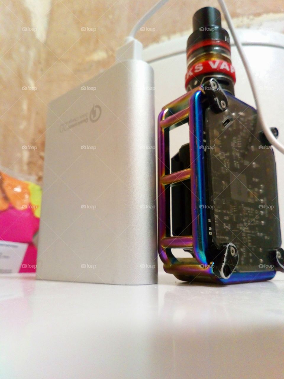 my battery charger and my vape sharing a toilet together (sharing is caring)