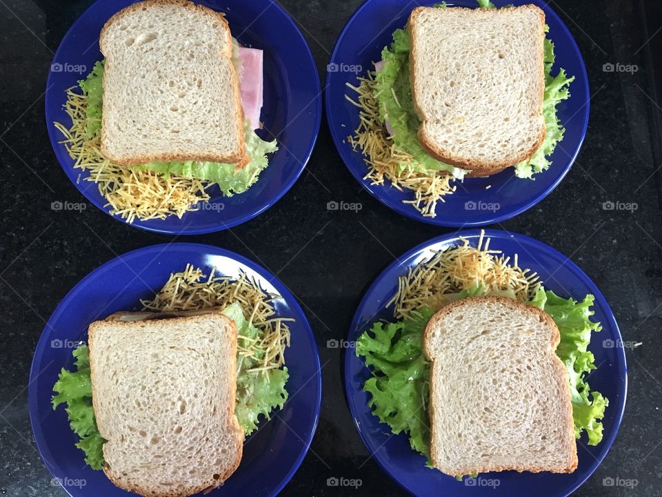 Mom preparing sandwiches for the family