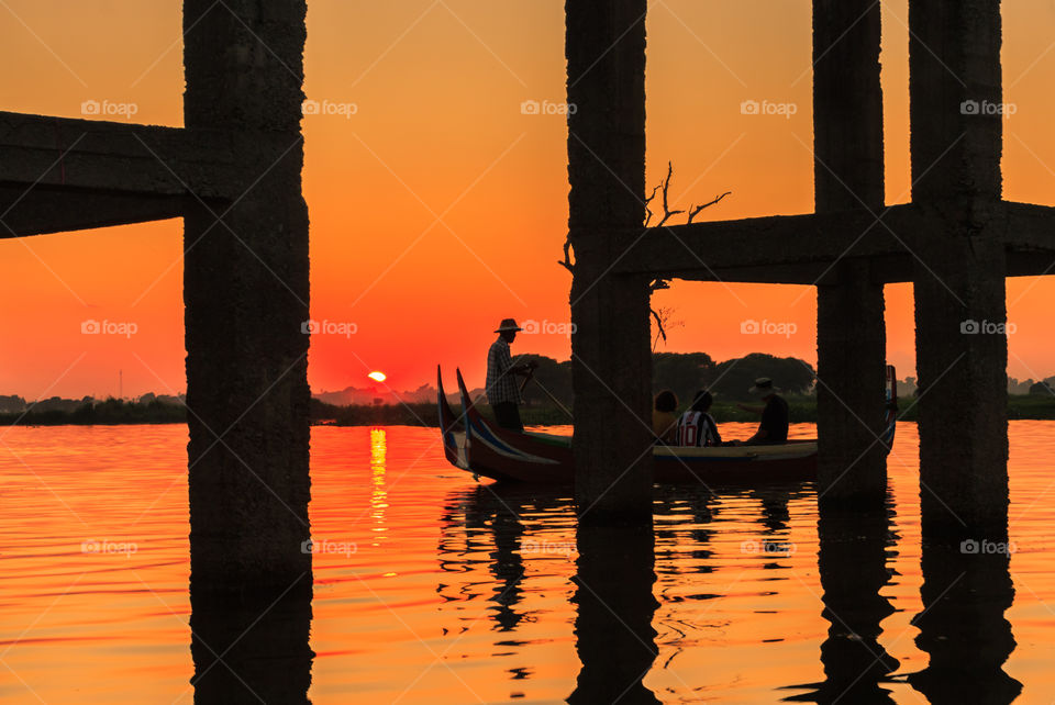 Boating at golden hour. Boating at golden hour, sunset at lake in Mandalay, Myanmar.