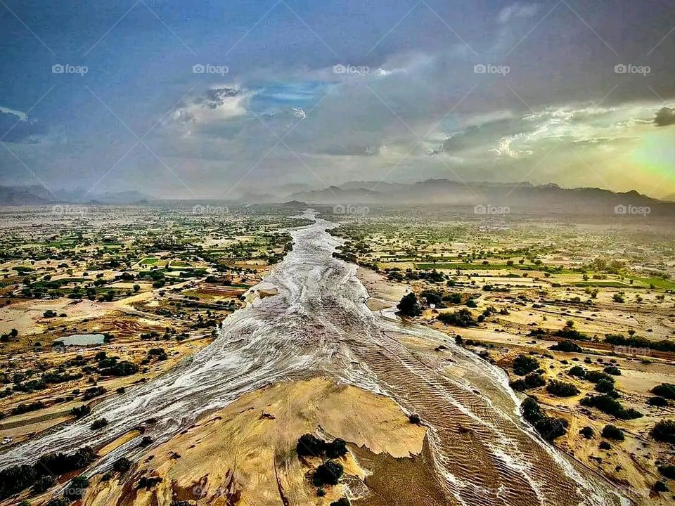 Glory be to God, the magnificent and picturesque view and the natural green trees are a view that is nothing more wonderful than it