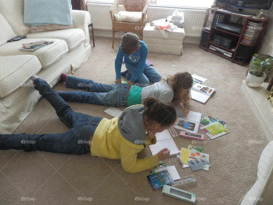 My three grandchildren, always busy. 