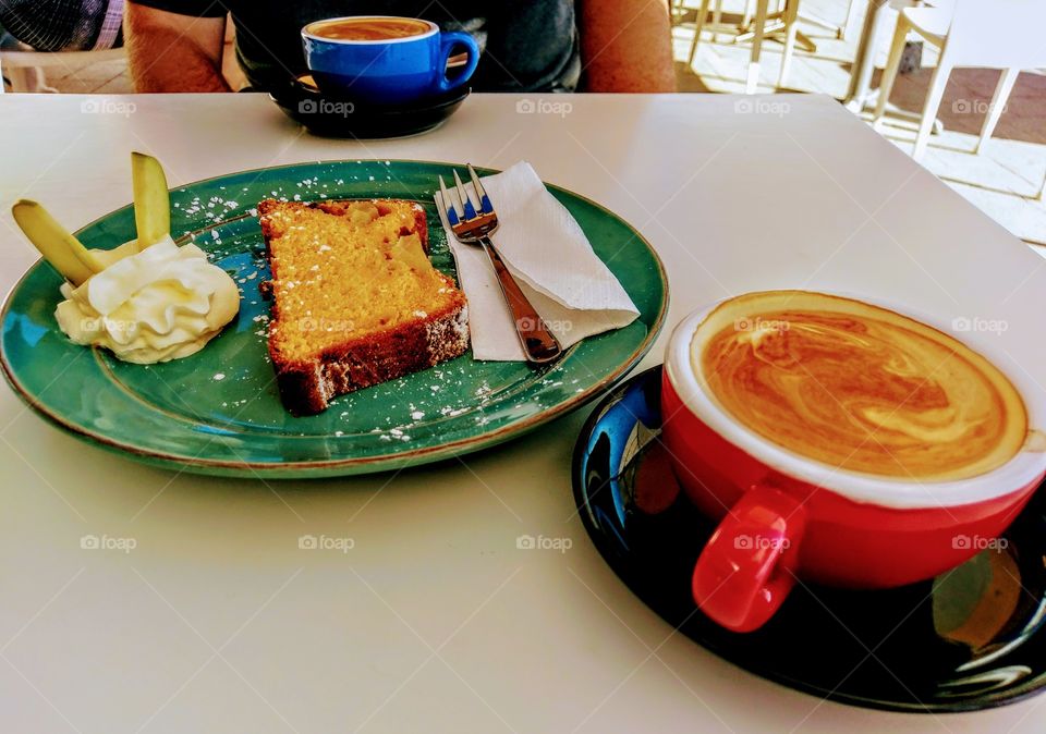 Sliced bread and coffee on table