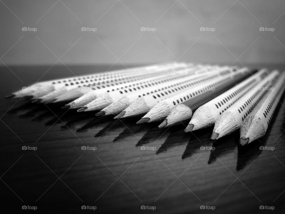 A black pencil among the others... different, but the same, all for the same purpose and job... internally the same. Equality...