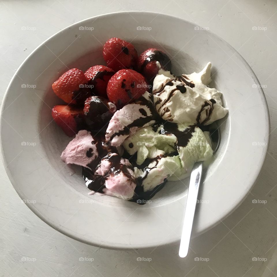 Icecream, cream and strawberry 