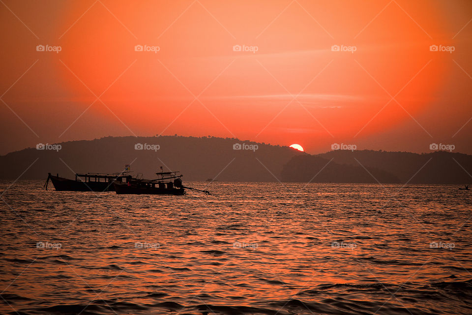 Scenic view of sea at sunset