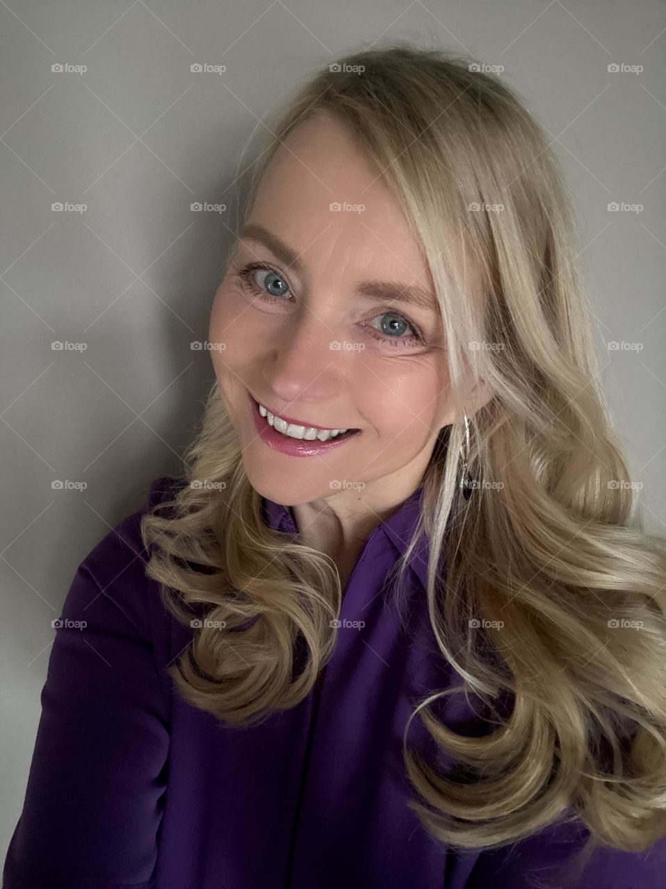 Self portrait of mature blonde female