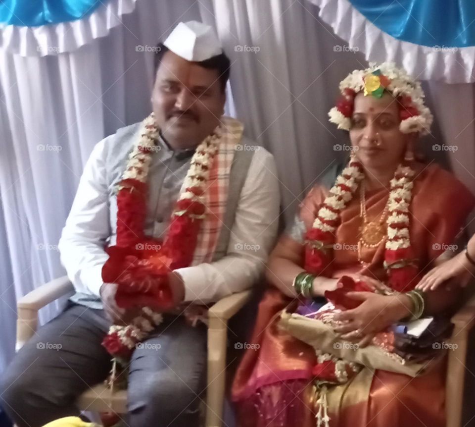 A beautiful young couple πβΊοΈ is very happy in the function of baby shawer! they excited for becoming parents. π₯πΌ their face express feeling happy π