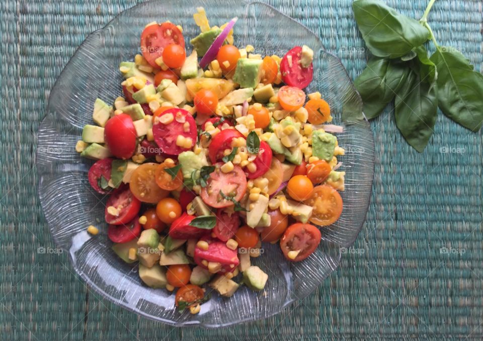 Avocado, corn and tomato salad