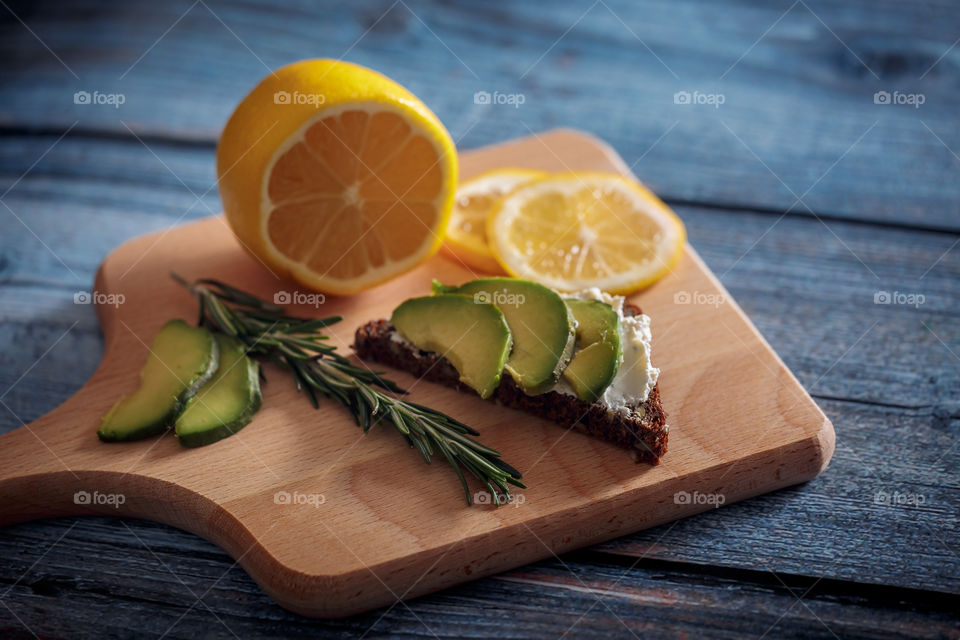 Dietary sandwiches with grain bread, cream cheese and avocado 