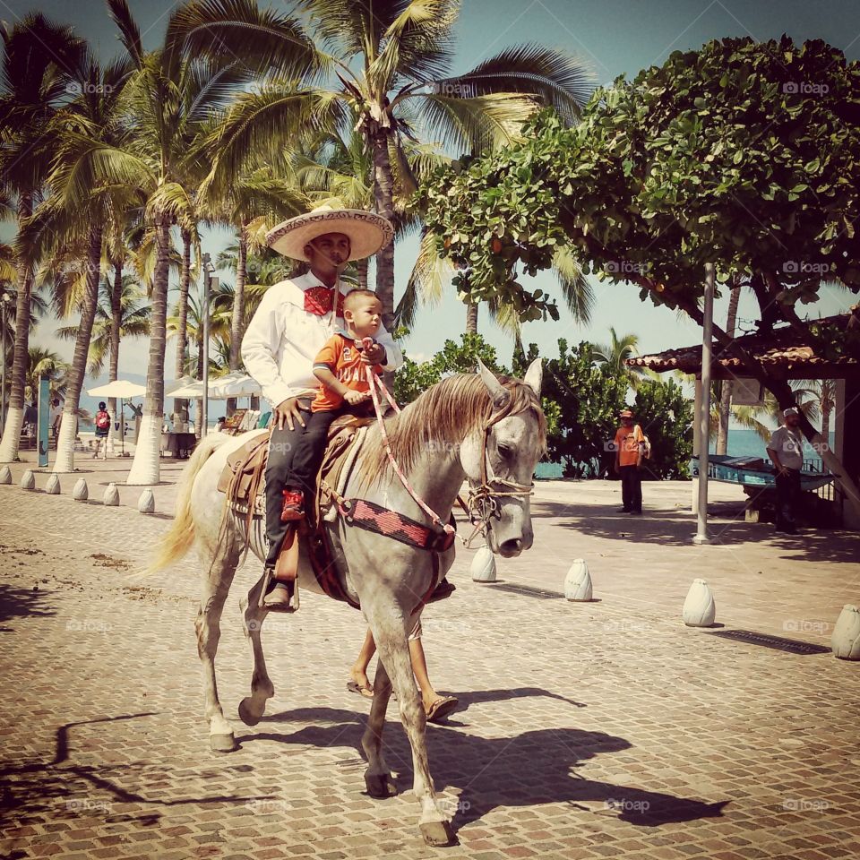 charros de jalisco. Cowboy parade in Puerto Vallarta