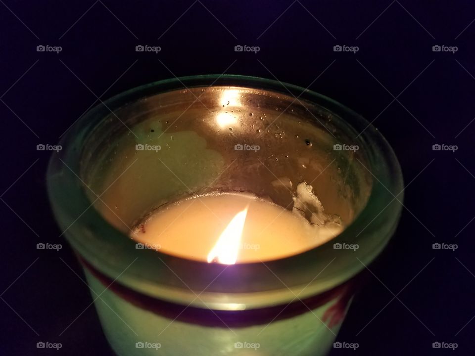candle burning in dark