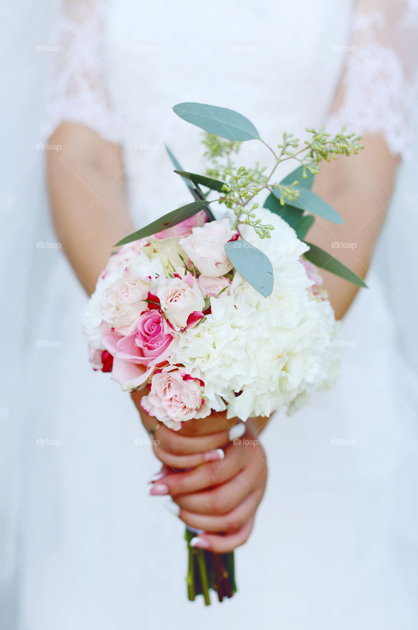 Bride holding a bouquet of flower