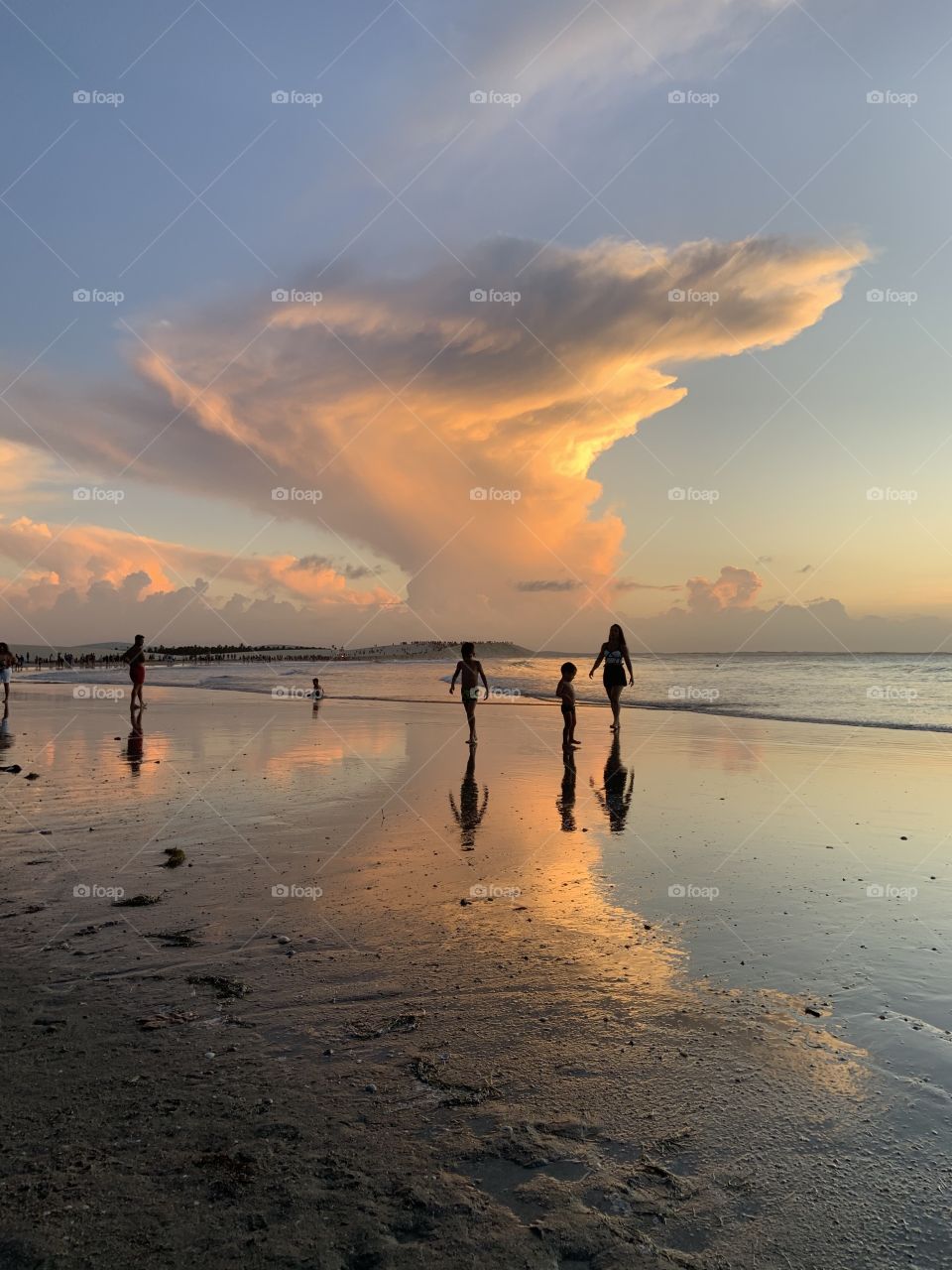 Clouds like hurricane at sunset 