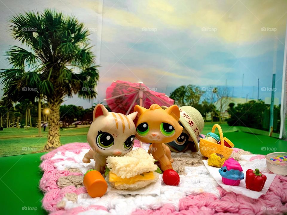 Characters LPS Toys For Kids Having A Picnic Scene With Our Exclusive Personal Photo Background From The Park In A Tropical Environment Looking At An Actual Real Mini Sandwich.