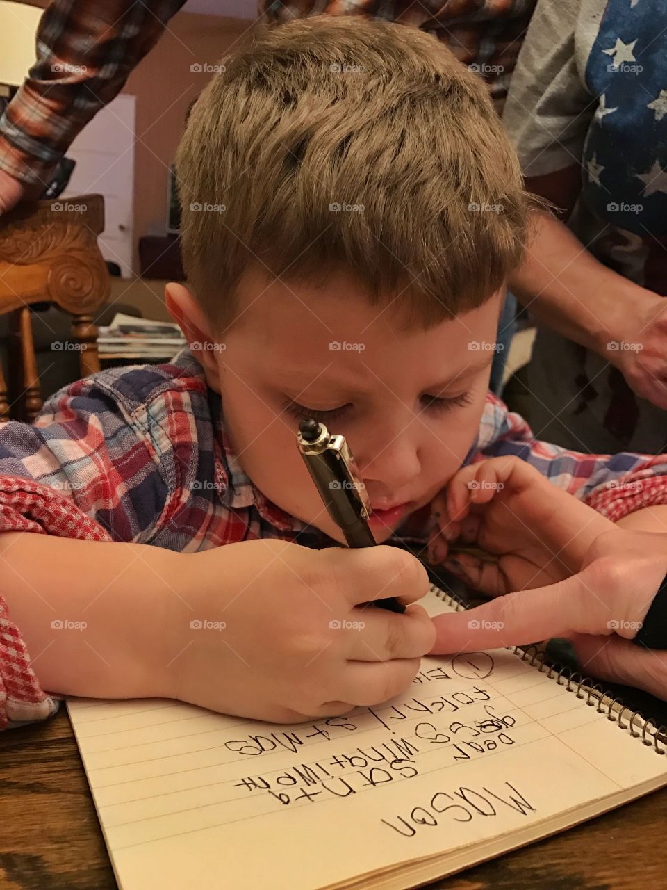 Mason writing his Christmas list for Santa!