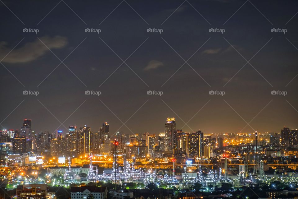 Twilight above skyscraper scape in Bangkok Thailand