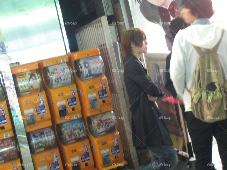 Akihabara, Tokyo, Japan. Fashionable Young Men in Pachinko Parlor, Gambling.