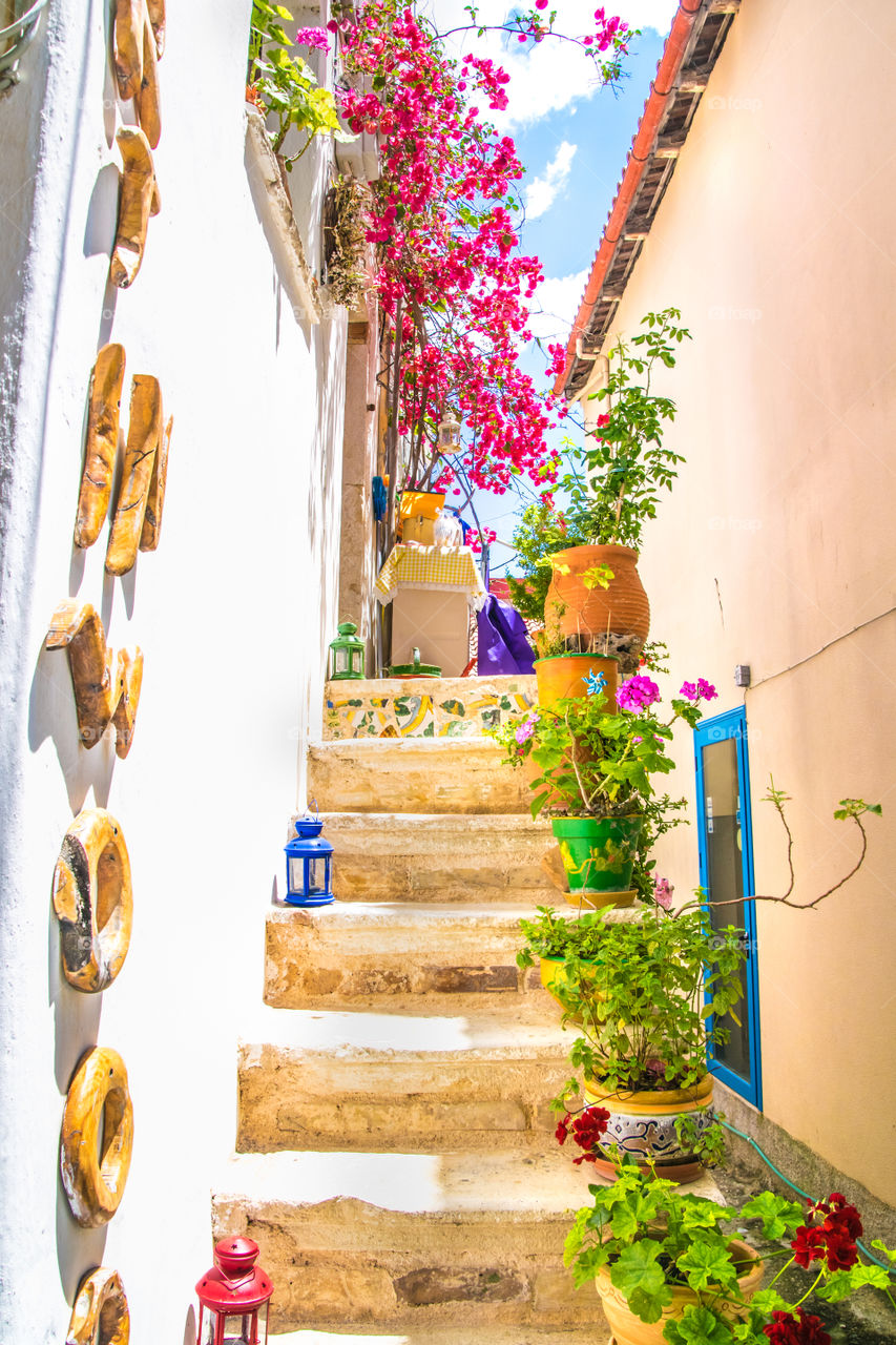 Traditional House With Colorful Flowers In Parga, Greece