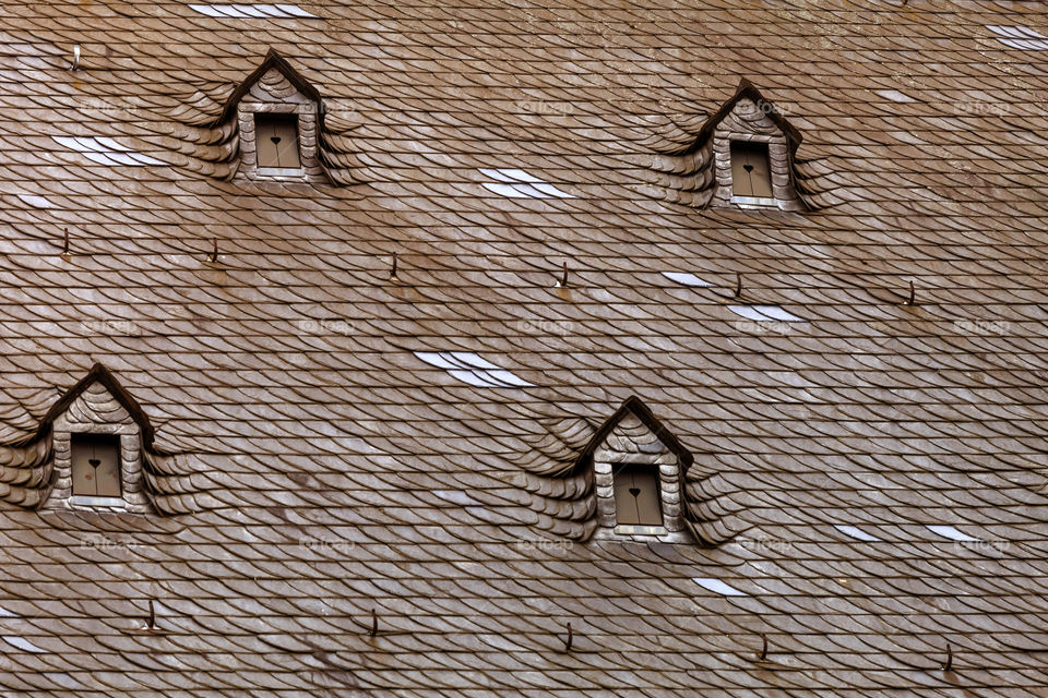 Wooden roof with tiny windows