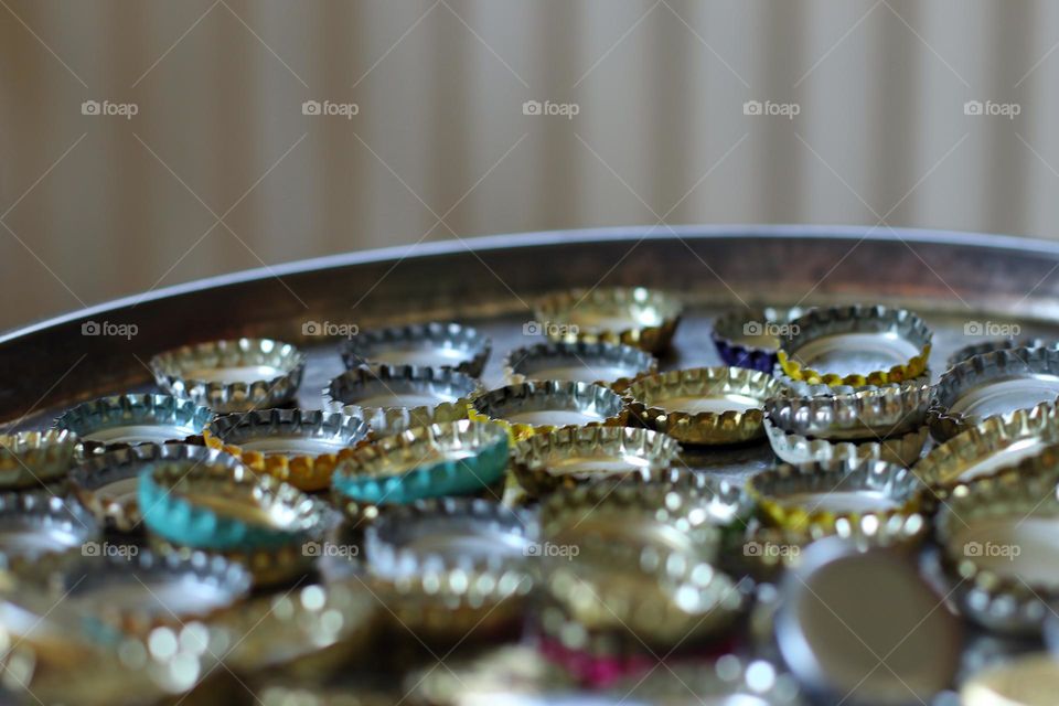 Close up of many bottle caps
