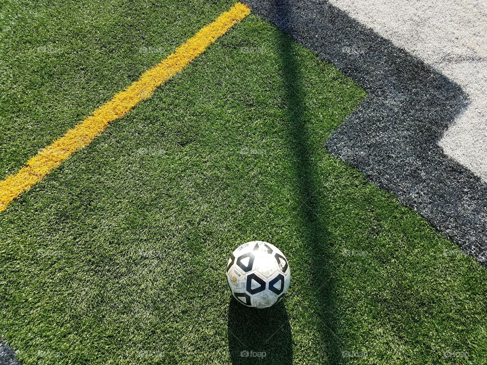 Soccer ball on soccer field.