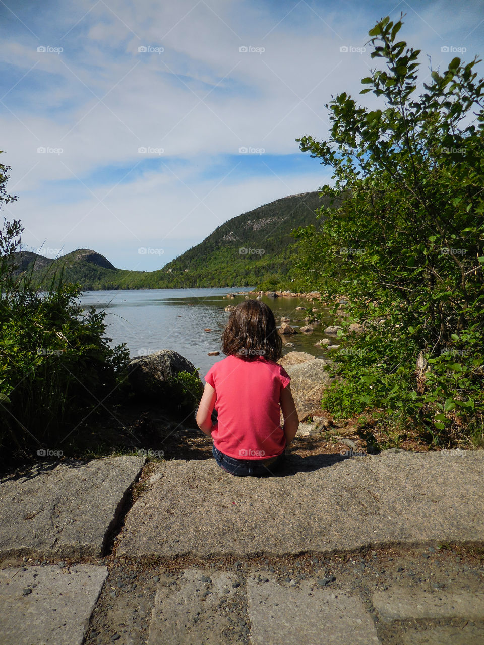 little girl ponders the beauty of Acadia