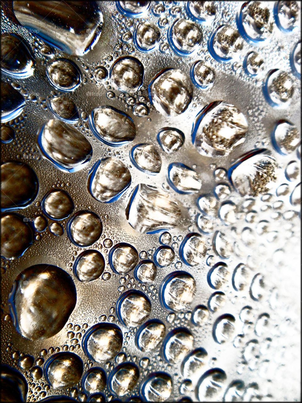 Silver water bubbles close up shoot colorful background summer feeling amazing droplets macro