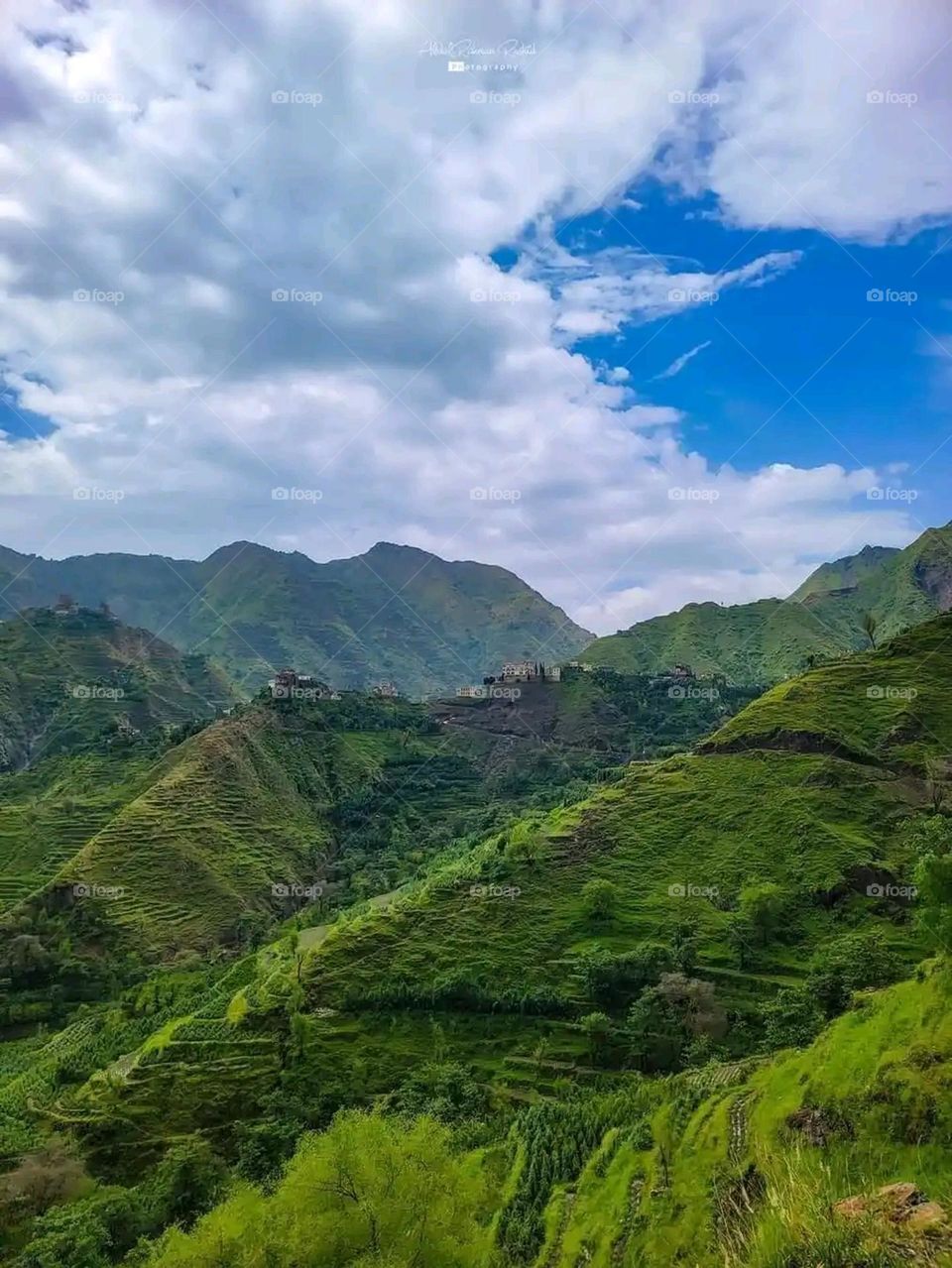 Glory be to God, the magnificent and picturesque view and the natural green trees are a view that is nothing more wonderful than it