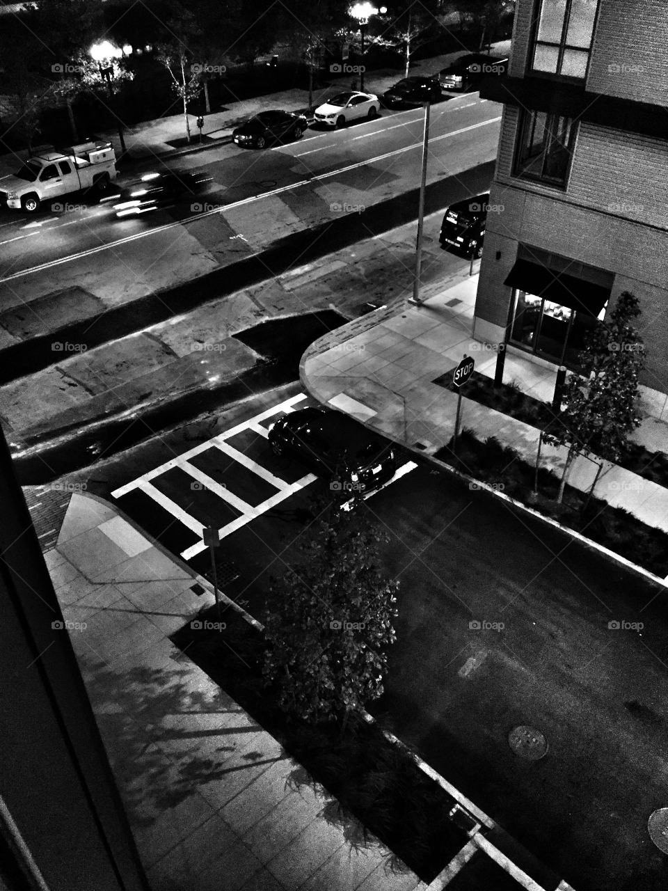 Mini Cooper convertible alone on street at night