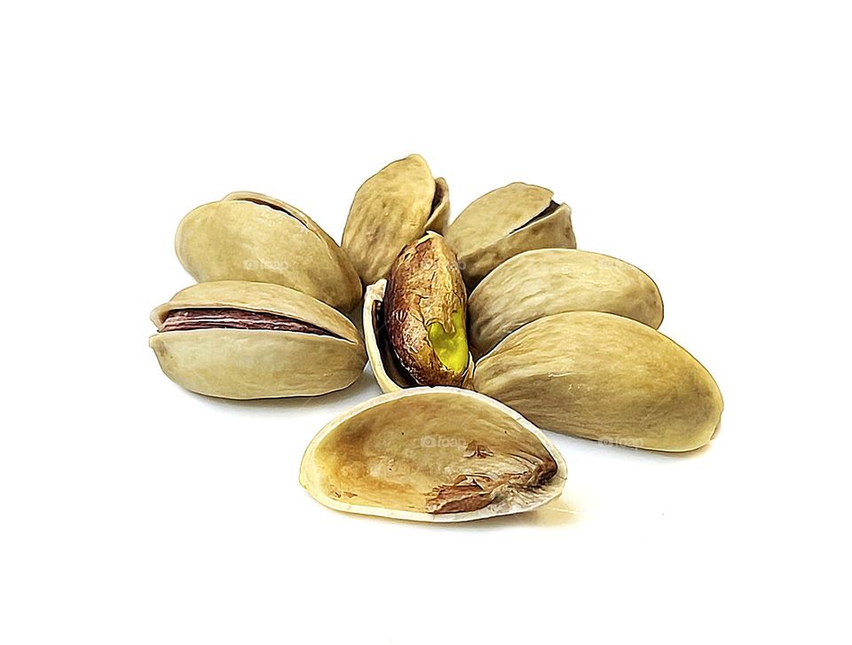 Pistachios shot on white background close-up