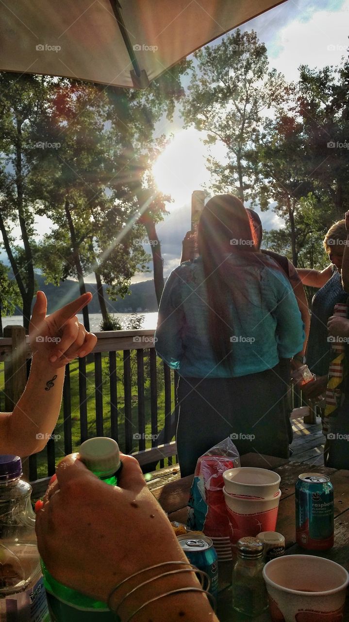 Just some girls grilling food, sharing drinks, and enjoying life on the lake!