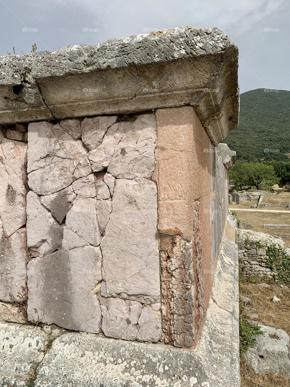 a glimpse of the Roman city forum in front of the ancient Via Flaminia