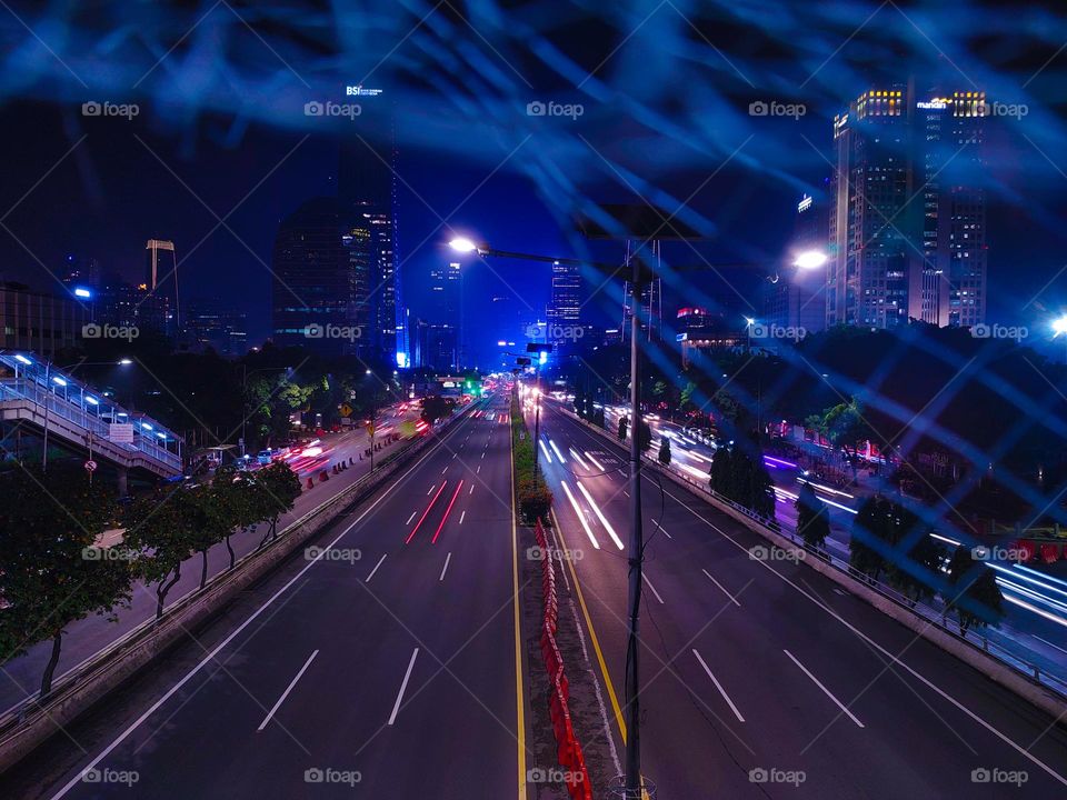 colorful traffic lights in the city of Jakarta at night