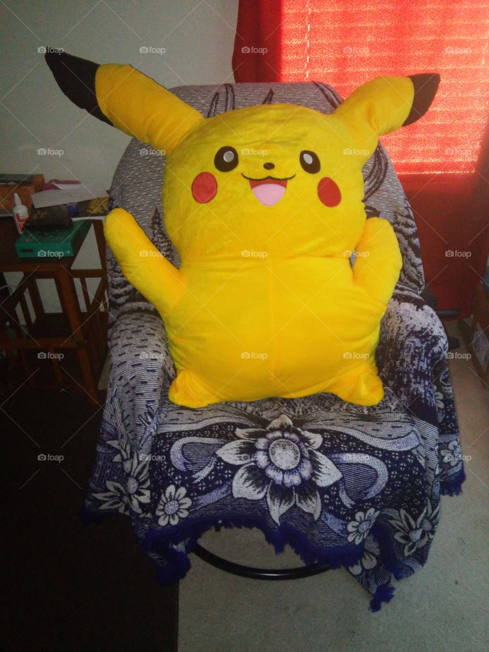 4 and a half foot tall pikachu stuffed animal.